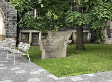 Image of a Face Sculpture outside Hart House at the University of Toronto. Photo Credits: Kylie Ng